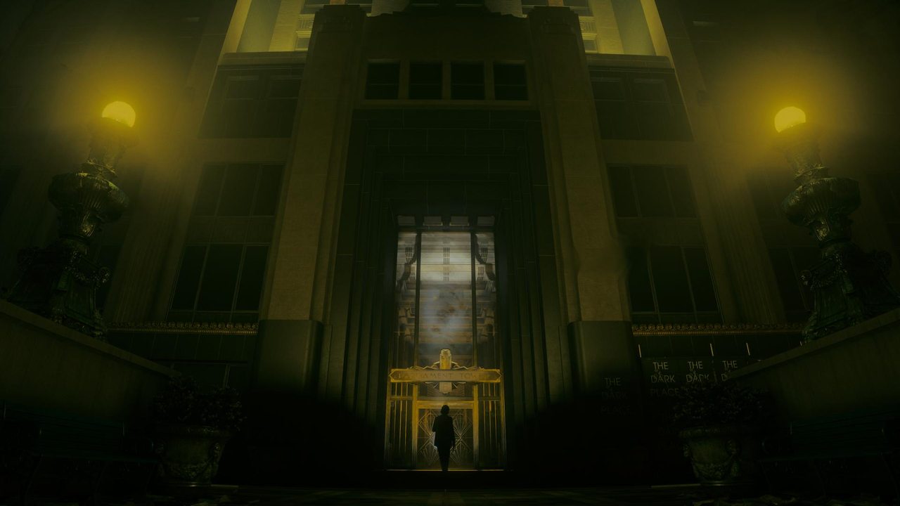A lit doorway in a dark hall