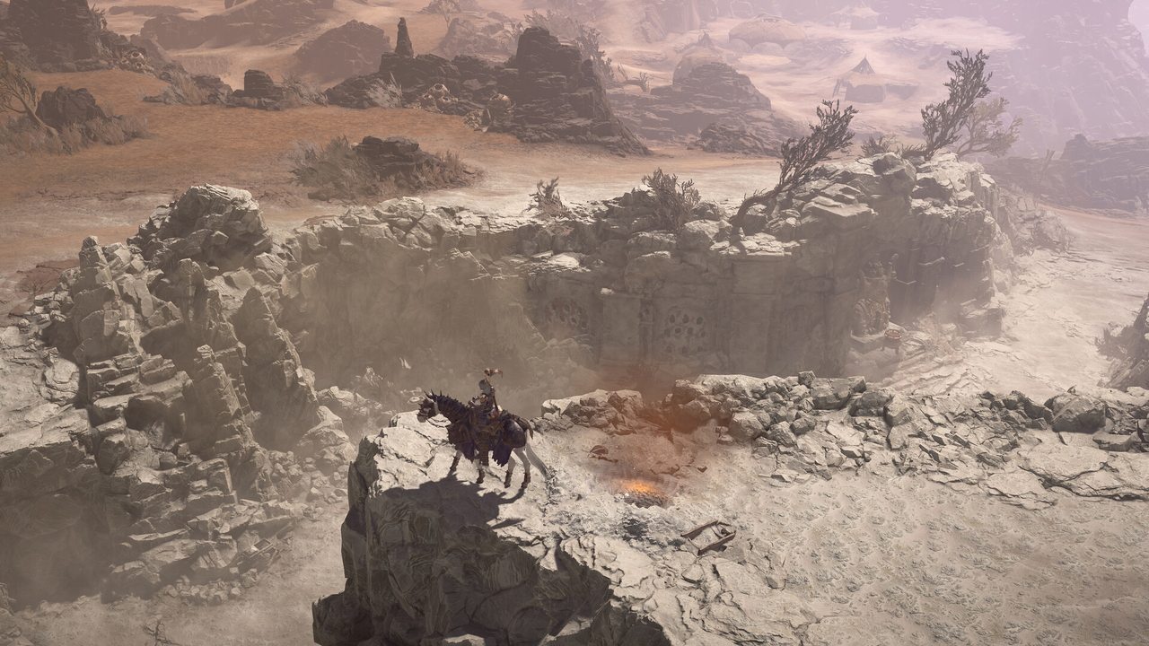 A rider on a rocky outcrop