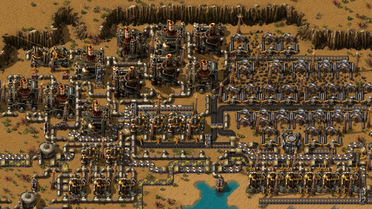 Rows of machines beside a lake
